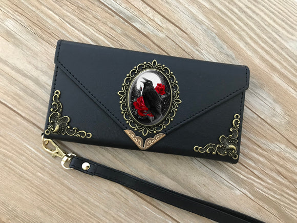 a black wallet with a red rose on it
